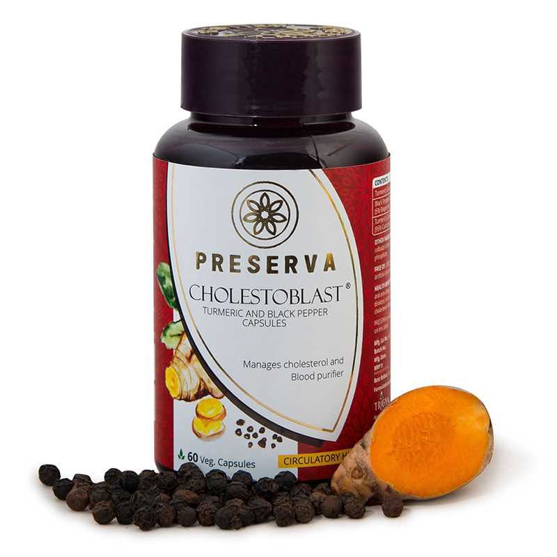 Preserva Wellness Cholestoblast Capsules with black pepper & sliced curcumin on a white background.