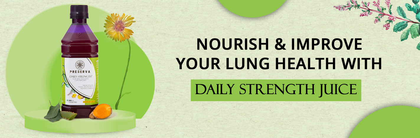 Preserva Wellness Daily Strength Juice on a green podium with Aloe Vera, Tulsi and sliced Curcumin