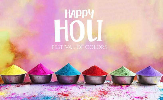 Happy Holi banner with different powder colours in steel containers
