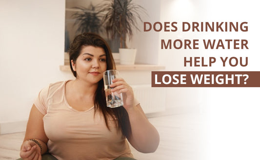  A woman drinking a glass of water for weight loss