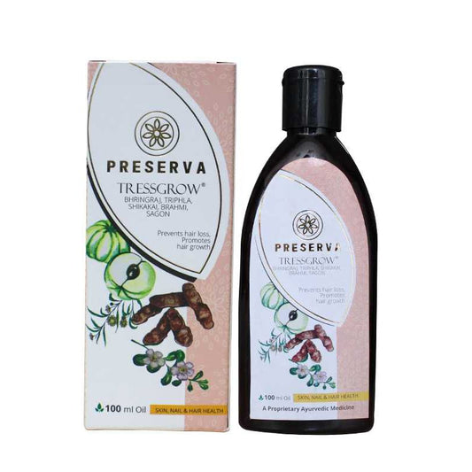 Preserva Wellness Tressgrow Oil and box on a white background
